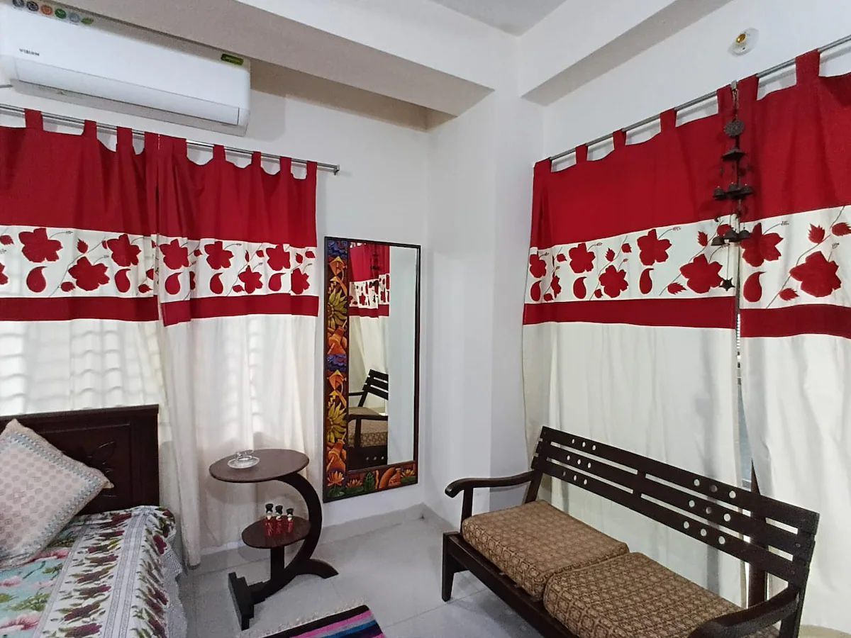 Bedroom Bedroom with nakshi throws and timber bench