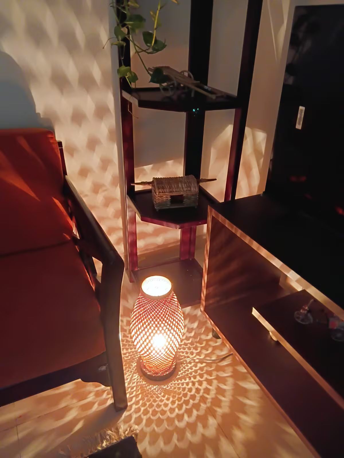 Lantern light Pierced lantern casting light patterns