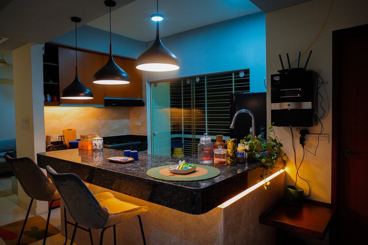 Kitchen island Kitchen island under black pendant lights